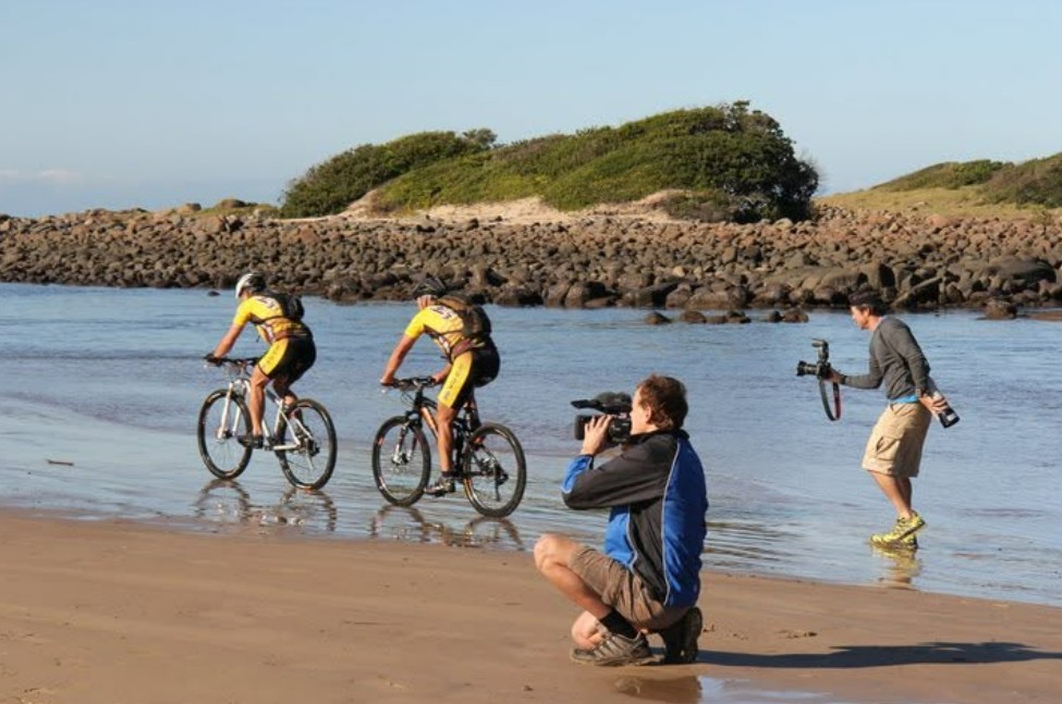 Cyclist riding along a Wild Coast trail