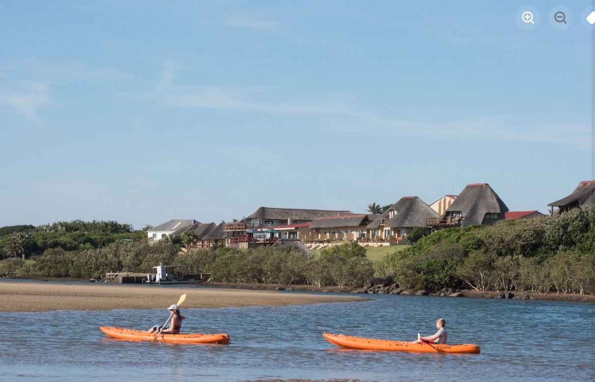Paddler exploring the river mouth