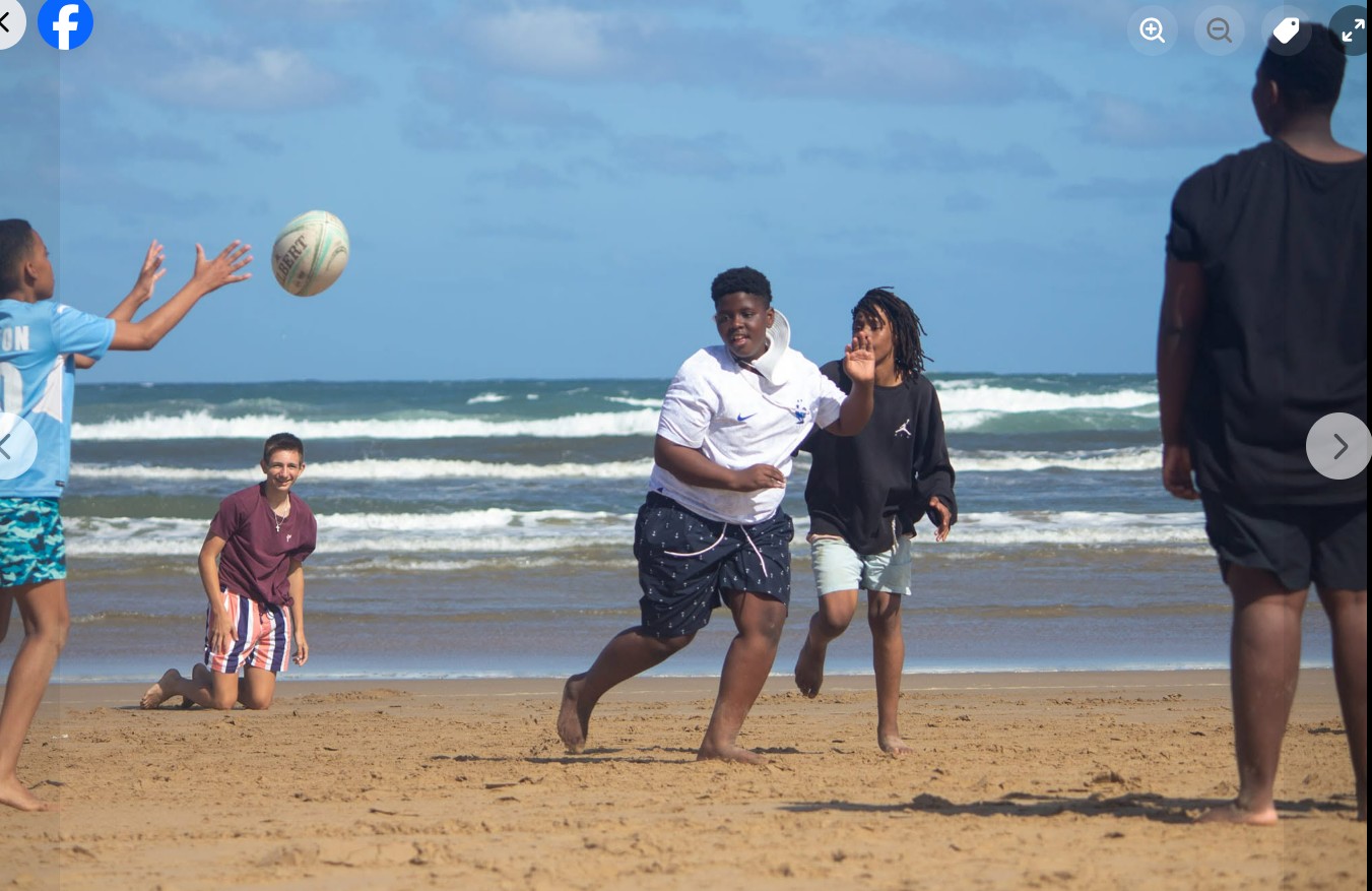 Family enjoying the beach together