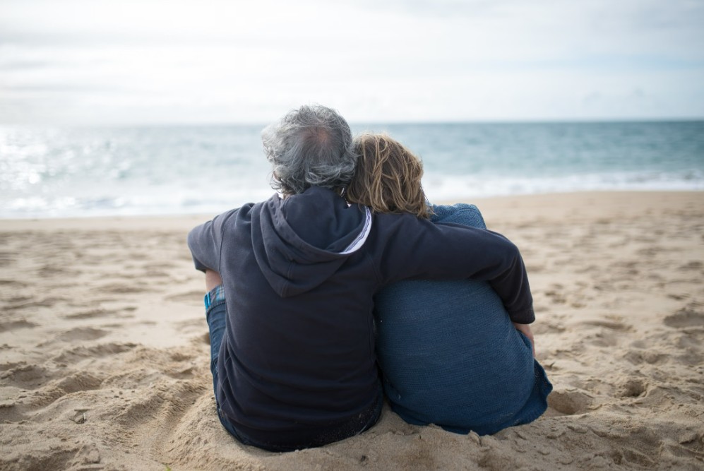 Relaxed senior couple enjoying a coastal stay